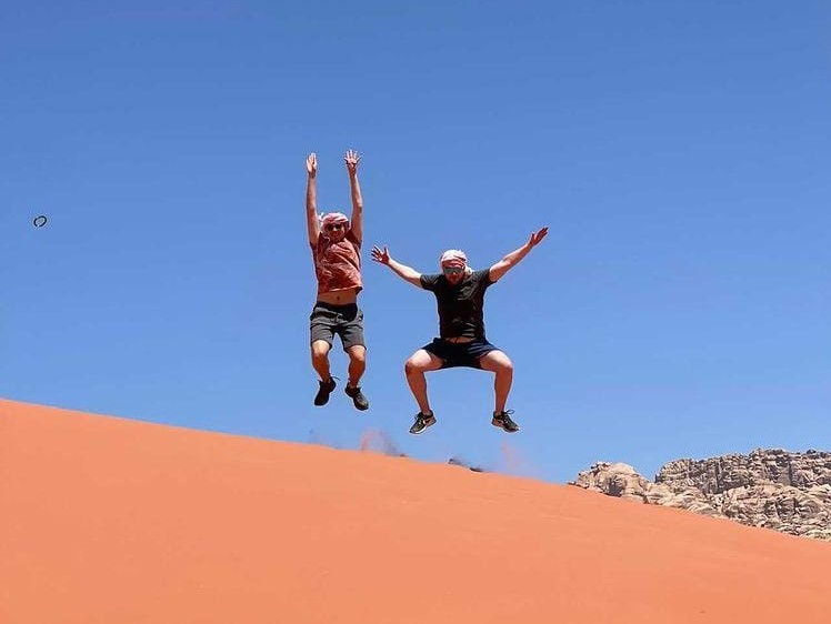 wadi rum happy tour and camp deser sand dune jump